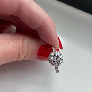 Oval diamond ring with white gold band. Size 5.5. Center stone is 1 1/4 ct